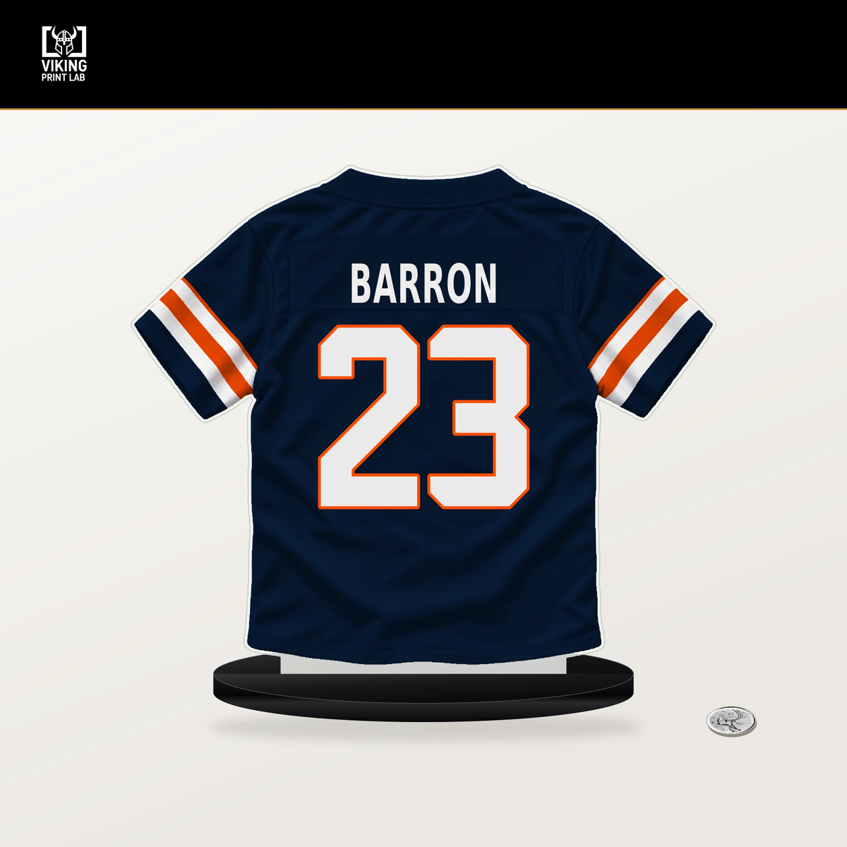 Jahdae Barron number 23 Denver Broncos jersey stand with included black base.