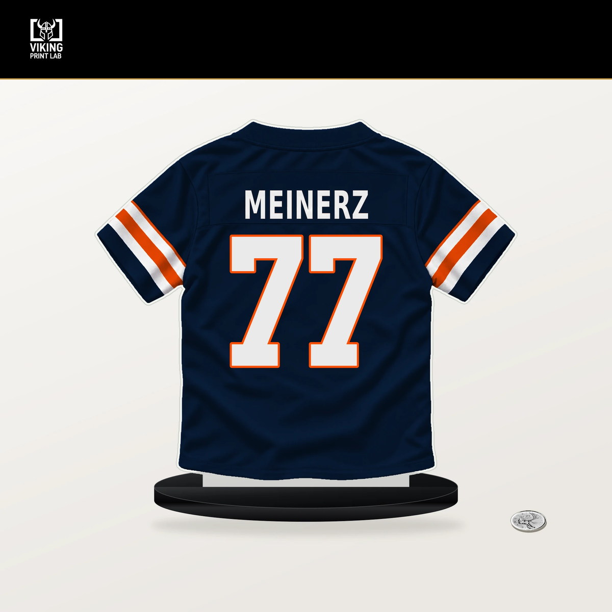 Quinn Meinerz number 77 Denver Broncos jersey stand with included black base.