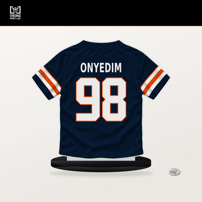 Tyler Onyedim number 98 Denver Broncos jersey stand with included black base.