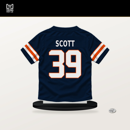 Miles Scott number 39 Denver Broncos jersey stand with included black base.