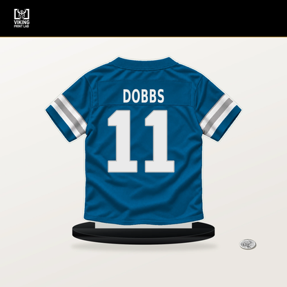 Joshua Dobbs number 11 Detroit Lions jersey stand with included black base.