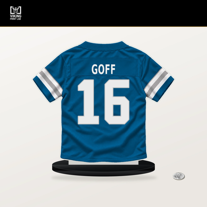 Jared Goff number 16 Detroit Lions jersey stand with included black base.
