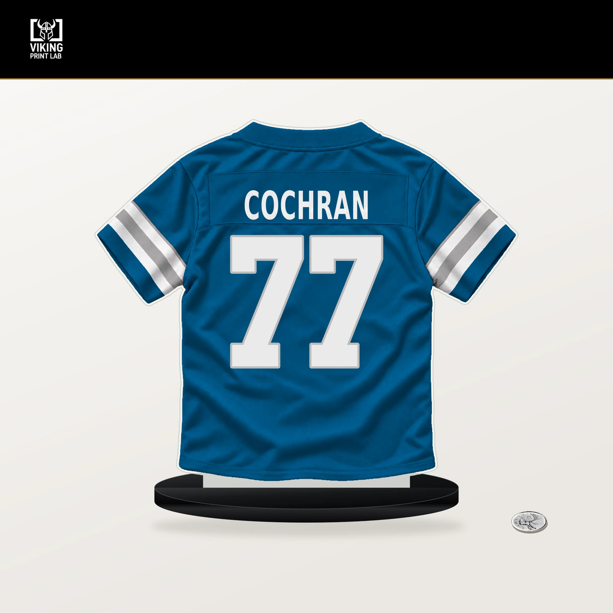 Devin Cochran number 77 Detroit Lions jersey stand with included black base.
