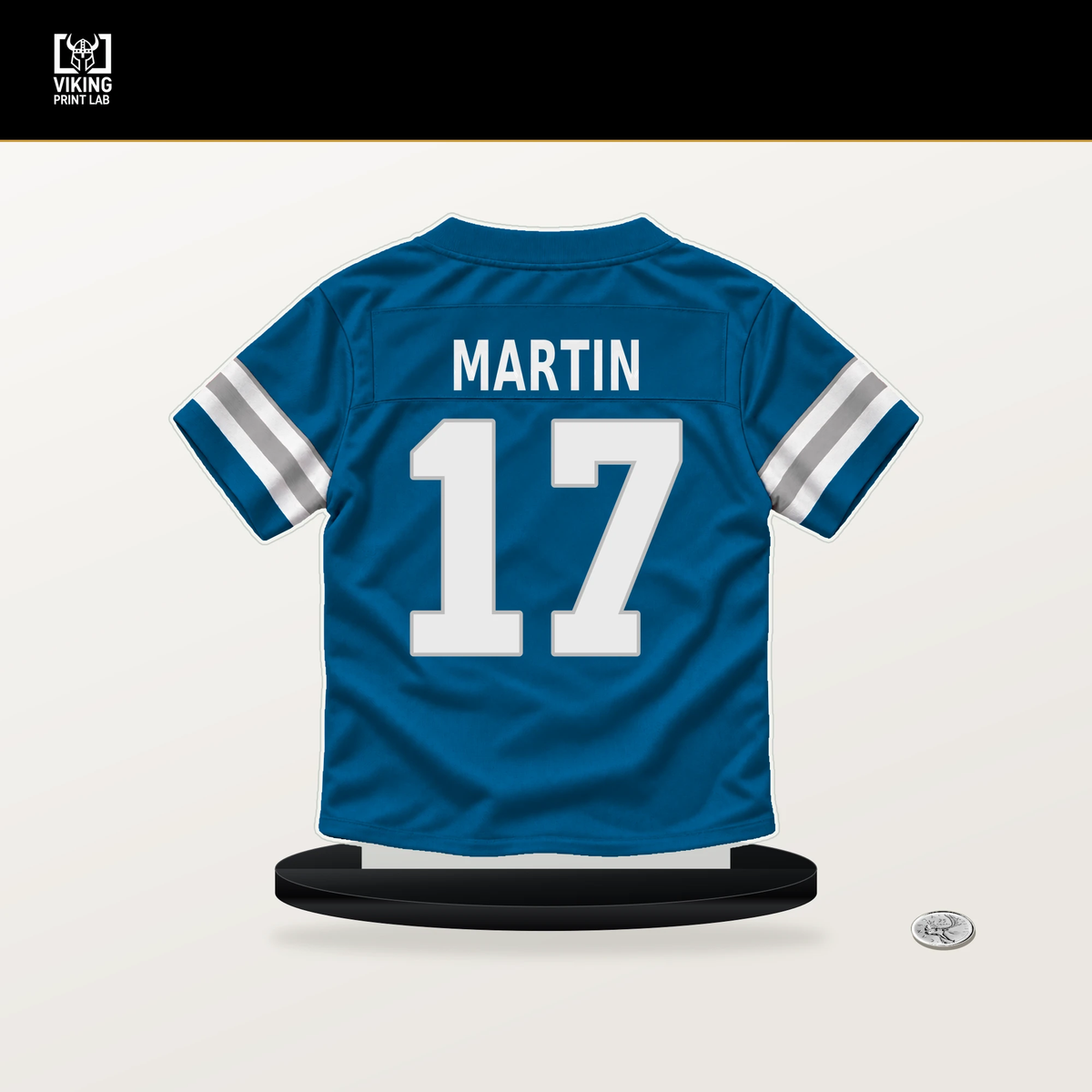 Tay Martin number 17 Detroit Lions jersey stand with included black base.