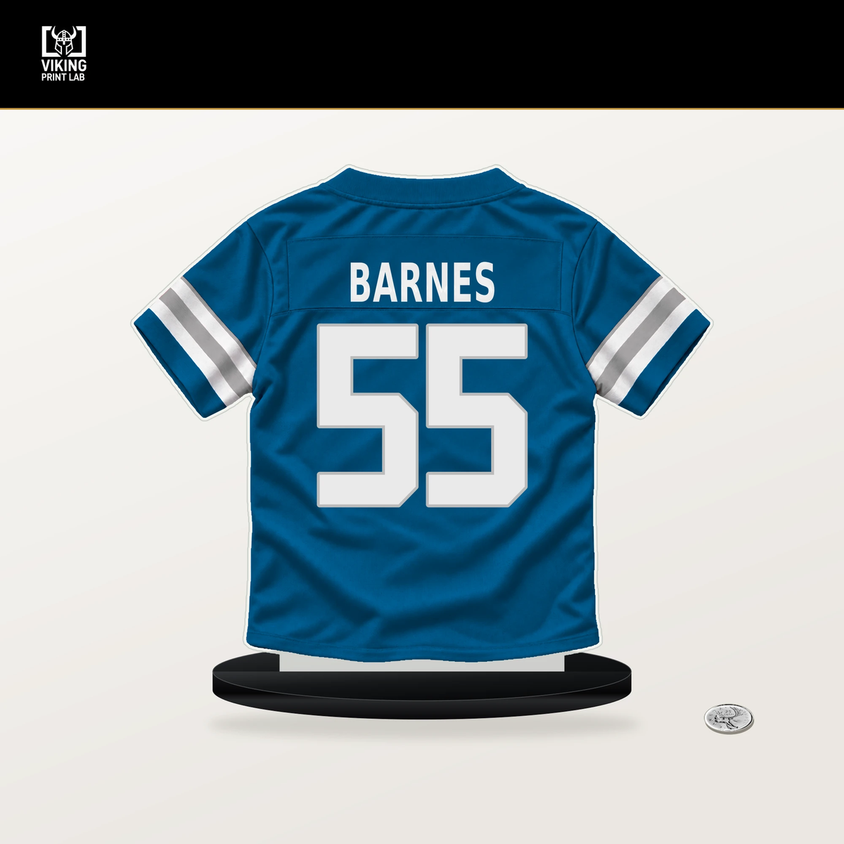 Derrick Barnes number 55 Detroit Lions jersey stand with included black base.