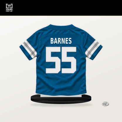 Derrick Barnes number 55 Detroit Lions jersey stand with included black base.