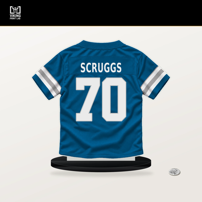 Juice Scruggs number 70 Detroit Lions jersey stand with included black base.