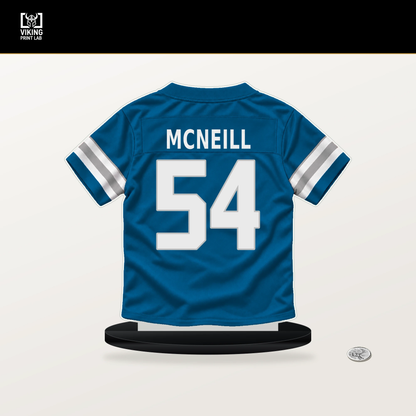 Alim McNeill number 54 Detroit Lions jersey stand with included black base.