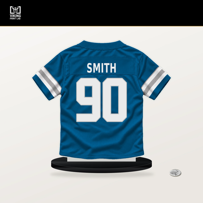 Chris Smith number 90 Detroit Lions jersey stand with included black base.