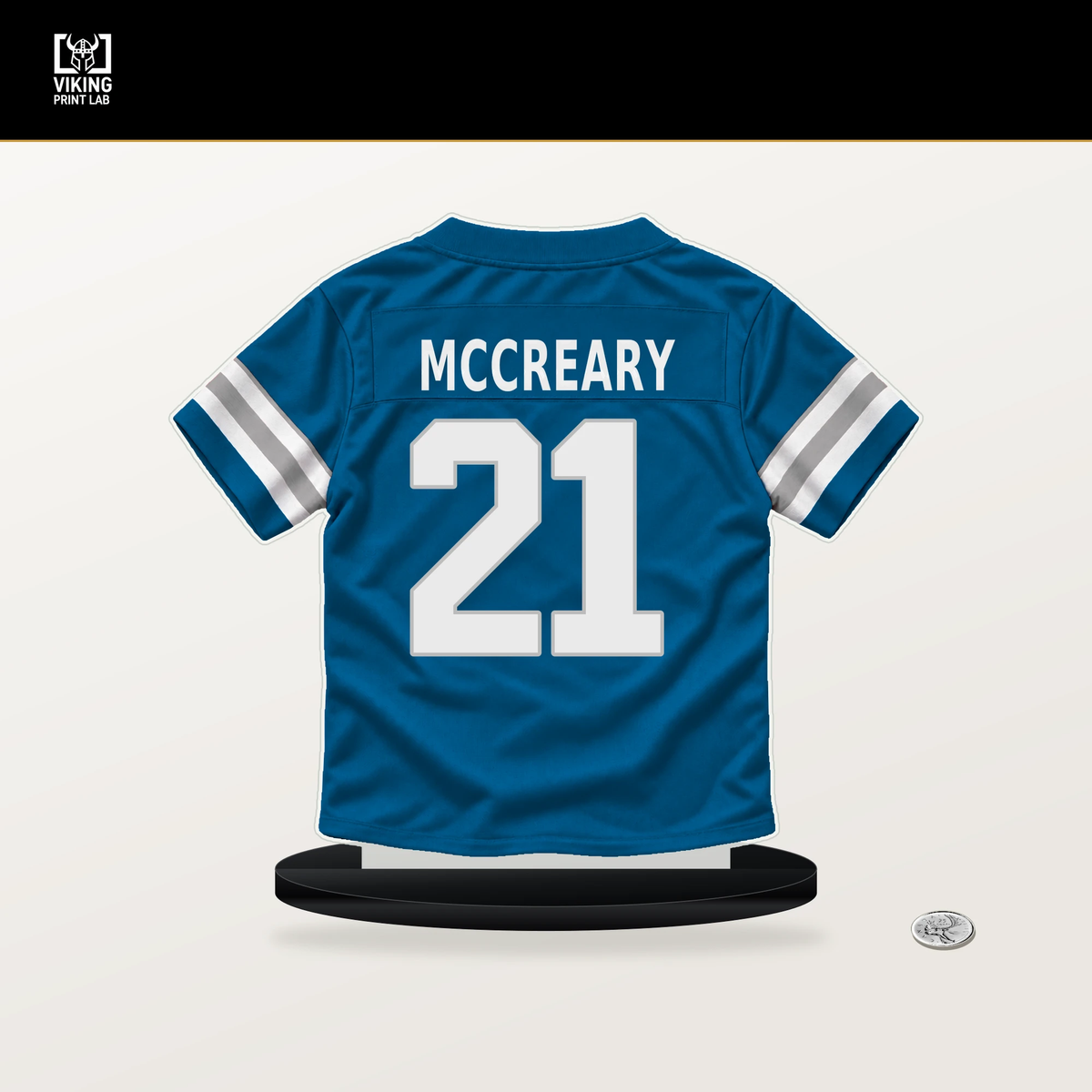 Roger McCreary number 21 Detroit Lions jersey stand with included black base.