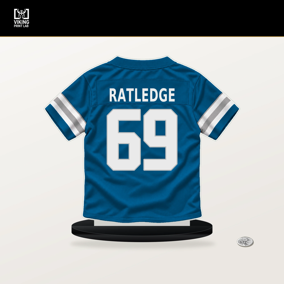 Tate Ratledge number 69 Detroit Lions jersey stand with included black base.