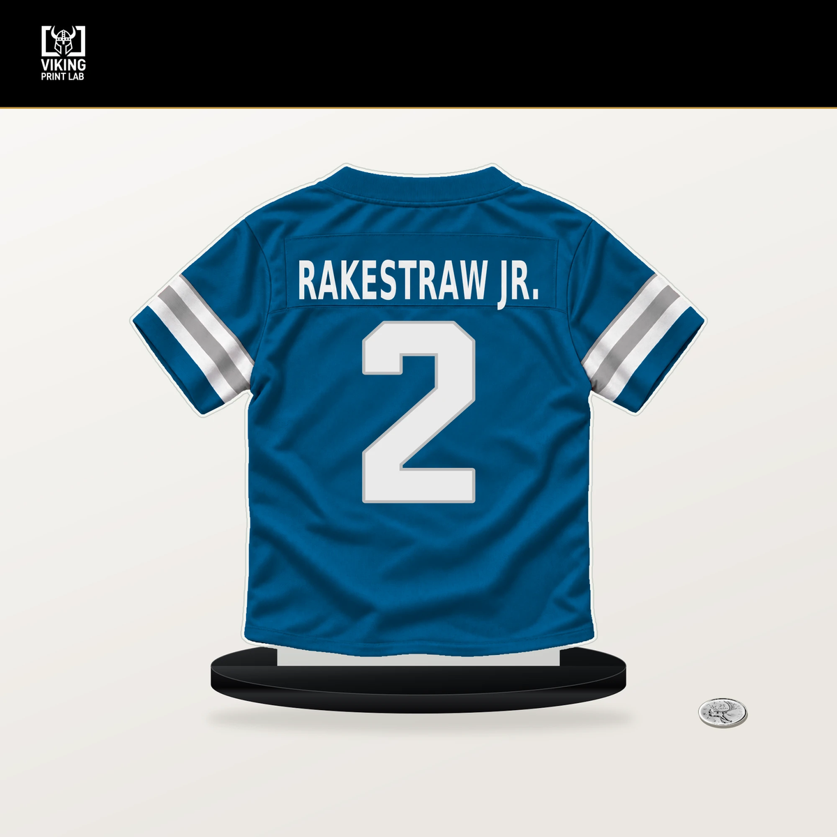 Ennis Rakestraw Jr. number 2 Detroit Lions jersey stand with included black base.