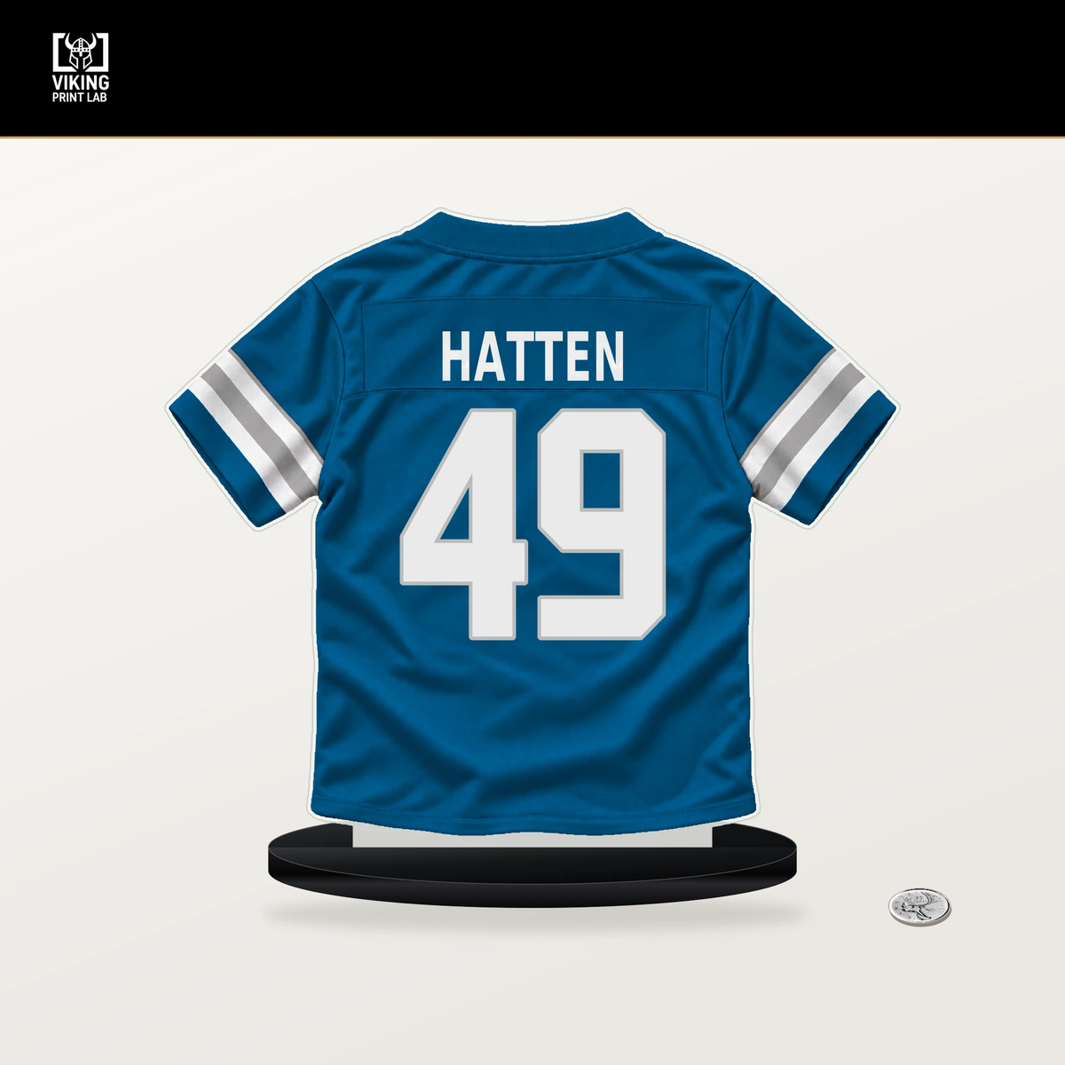 Hogan Hatten number 49 Detroit Lions jersey stand with included black base.