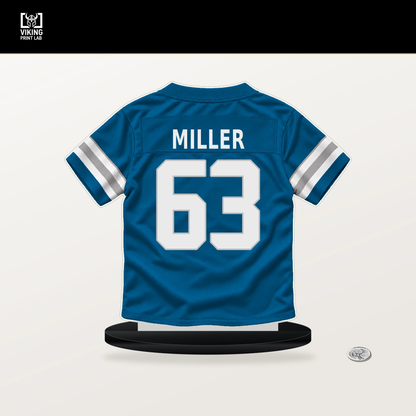 Mason Miller number 63 Detroit Lions jersey stand with included black base.
