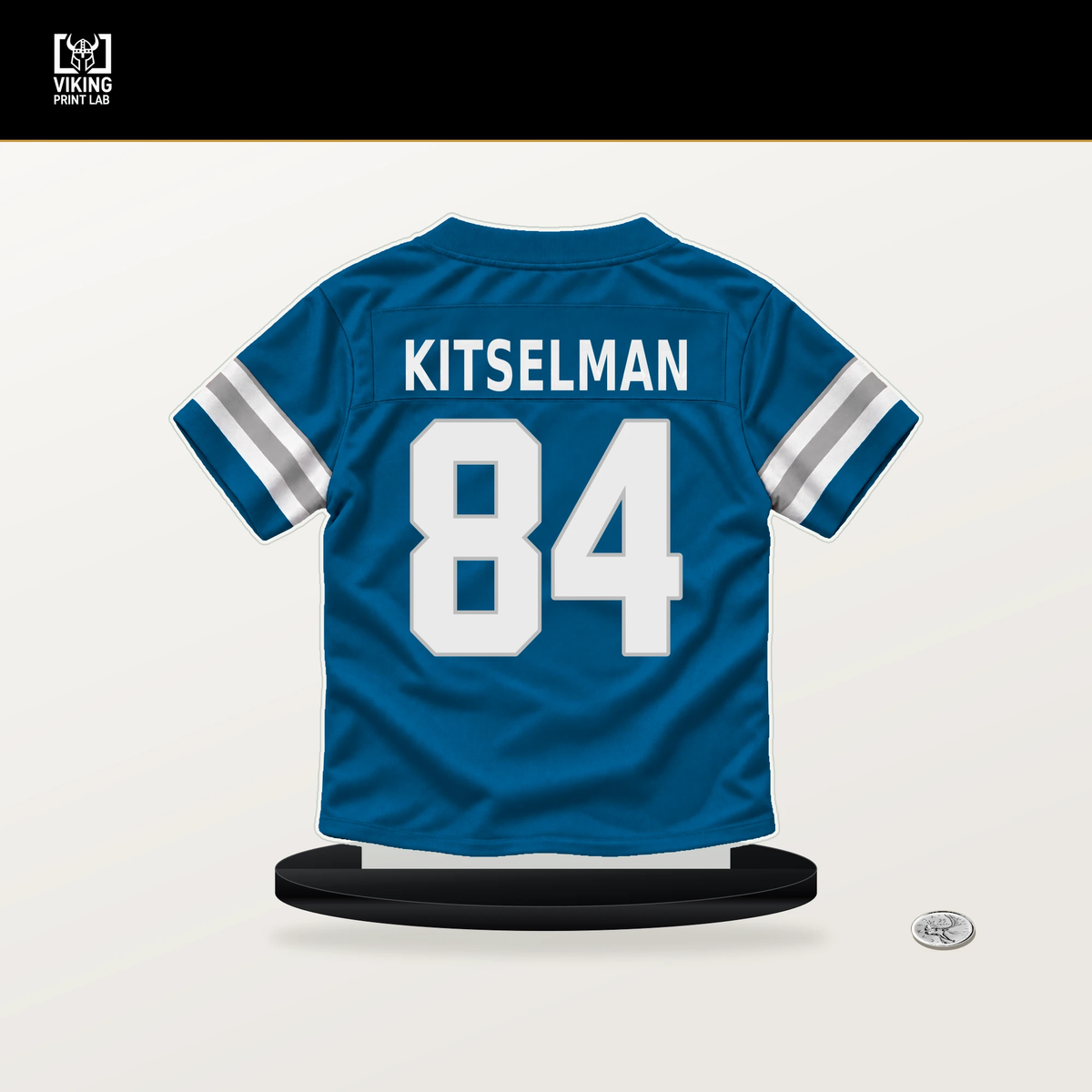 Miles Kitselman number 84 Detroit Lions jersey stand with included black base.
