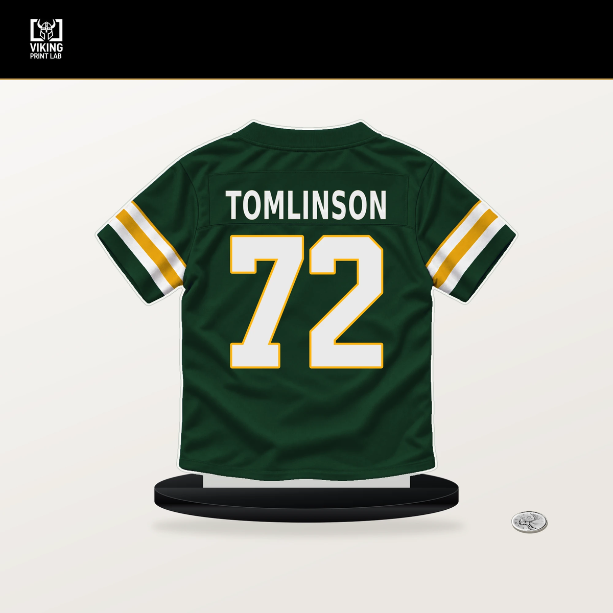 Laken Tomlinson number 72 Green Bay Packers jersey stand with included black base.