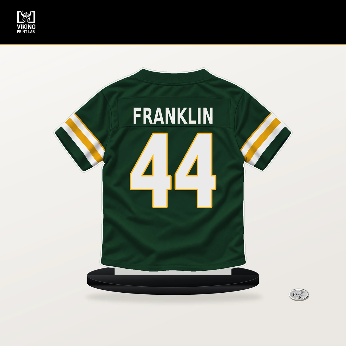 Zaire Franklin number 44 Green Bay Packers jersey stand with included black base.