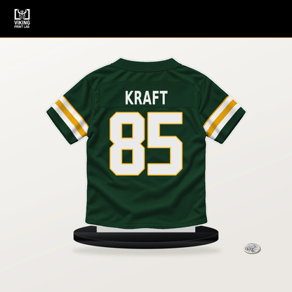 Tucker Kraft number 85 Green Bay Packers jersey stand with included black base.