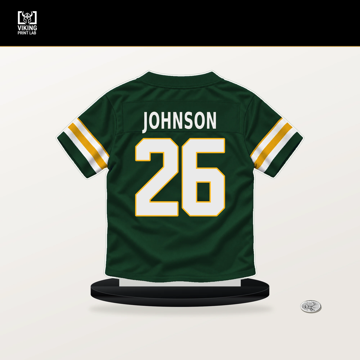 Kaleb Johnson number 26 Green Bay Packers jersey stand with included black base.