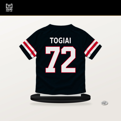 Tommy Togiai number 72 Houston Texans jersey stand with included black base.