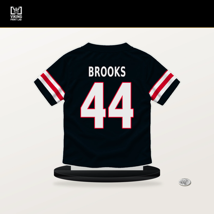 British Brooks number 44 Houston Texans jersey stand with included black base.