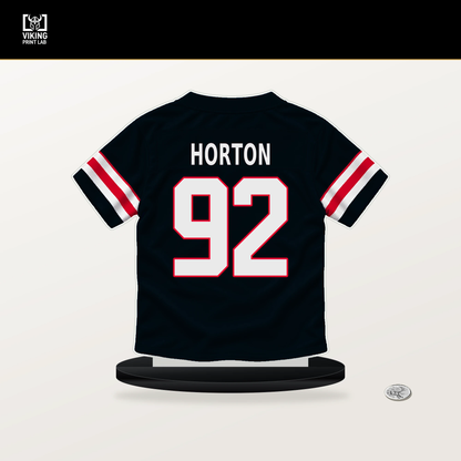 Dylan Horton number 92 Houston Texans jersey stand with included black base.