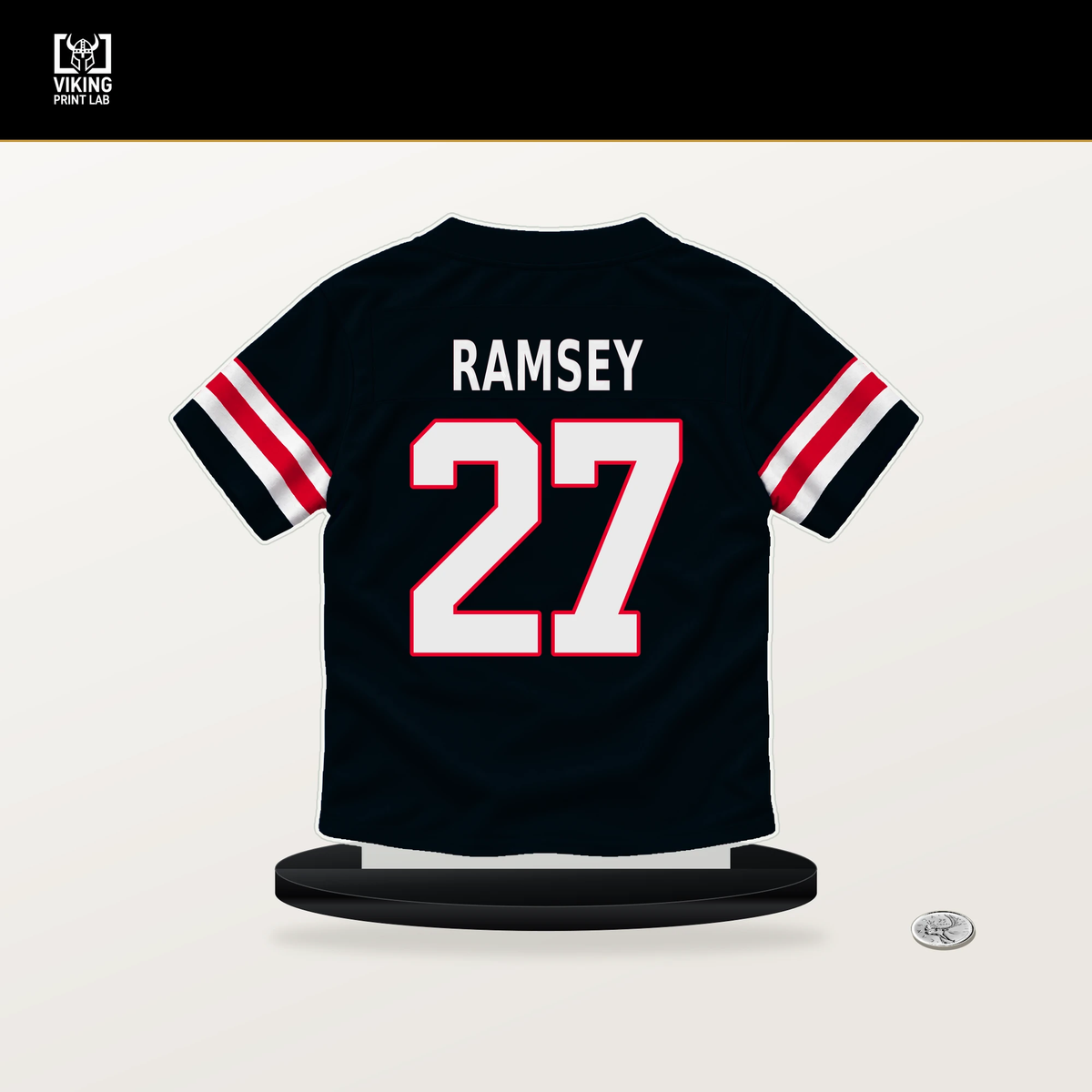 Kamari Ramsey number 27 Houston Texans jersey stand with included black base.