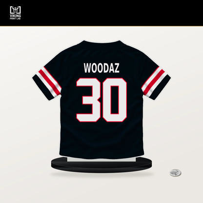 Wade Woodaz number 30 Houston Texans jersey stand with included black base.