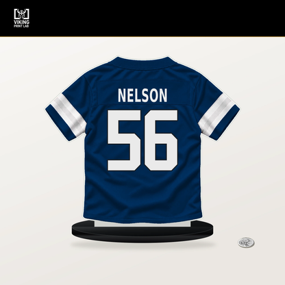 Quenton Nelson number 56 Indianapolis Colts jersey stand with included black base.