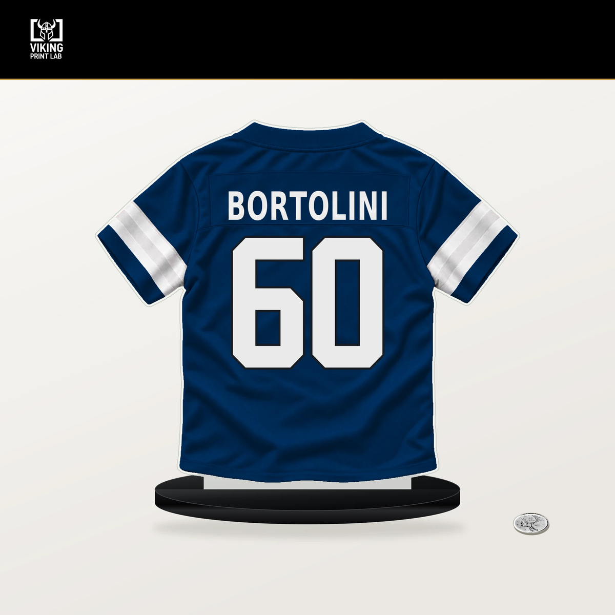 Tanor Bortolini number 60 Indianapolis Colts jersey stand with included black base.