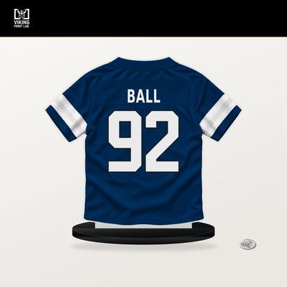 Cameron Ball number 92 Indianapolis Colts jersey stand with included black base.