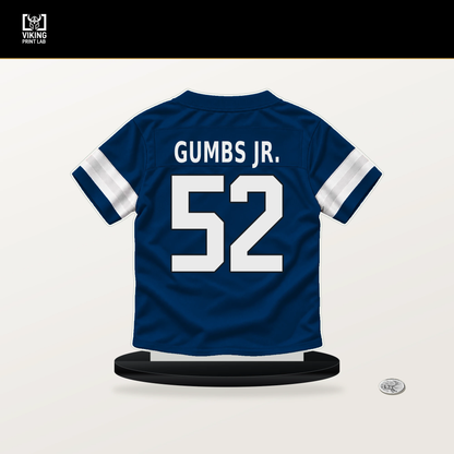 George Gumbs Jr. number 52 Indianapolis Colts jersey stand with included black base.
