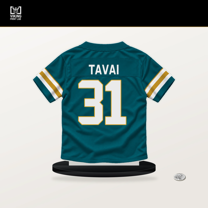 Jahlani Tavai number 31 Jacksonville Jaguars jersey stand with included black base.