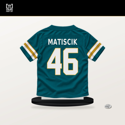 Ross Matiscik number 46 Jacksonville Jaguars jersey stand with included black base.
