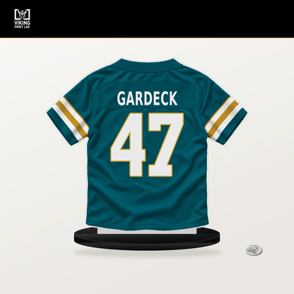 Dennis Gardeck number 47 Jacksonville Jaguars jersey stand with included black base.