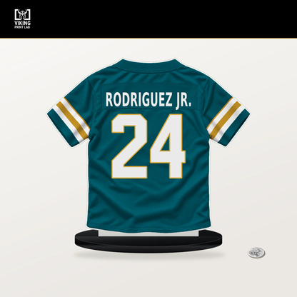 Chris Rodriguez Jr. number 24 Jacksonville Jaguars jersey stand with included black base.