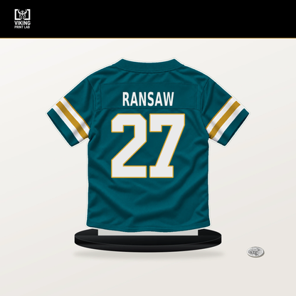 Caleb Ransaw number 27 Jacksonville Jaguars jersey stand with included black base.