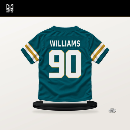 Wesley Williams number 90 Jacksonville Jaguars jersey stand with included black base.