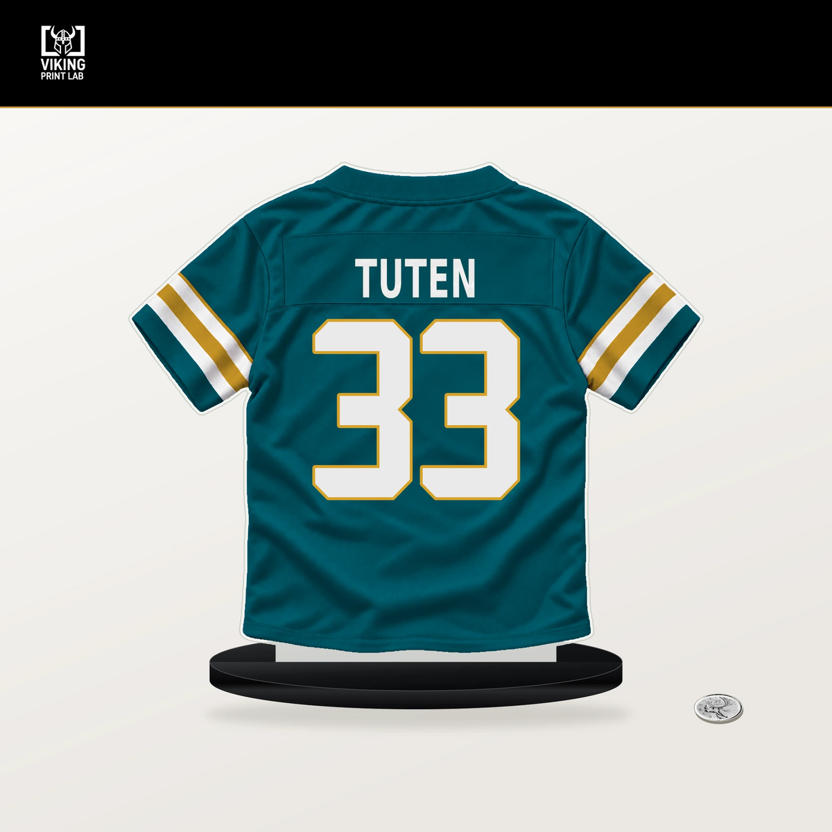 Bhayshul Tuten number 33 Jacksonville Jaguars jersey stand with included black base.