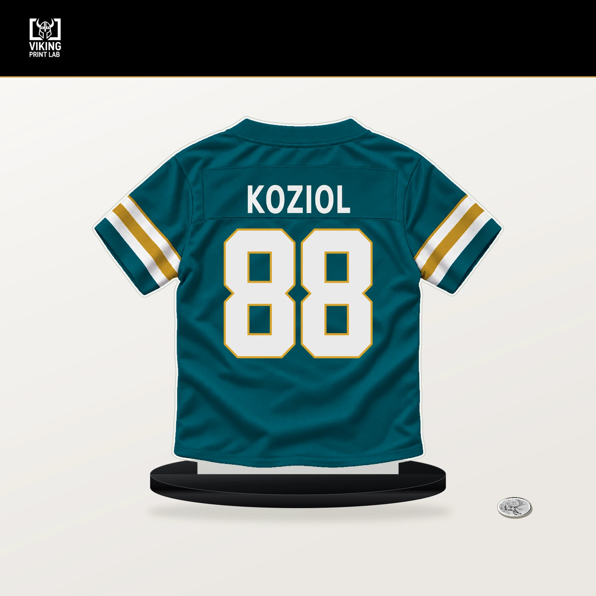 Tanner Koziol number 88 Jacksonville Jaguars jersey stand with included black base.
