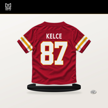 Travis Kelce number 87 Kansas City Chiefs jersey stand with included black base.