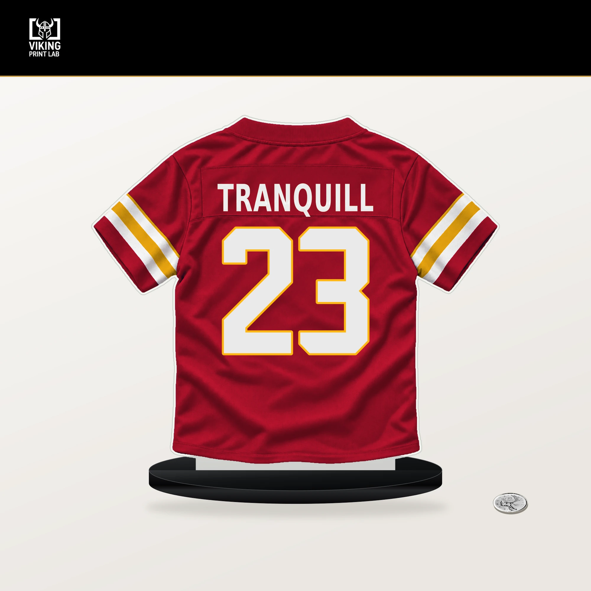 Drue Tranquill number 23 Kansas City Chiefs jersey stand with included black base.
