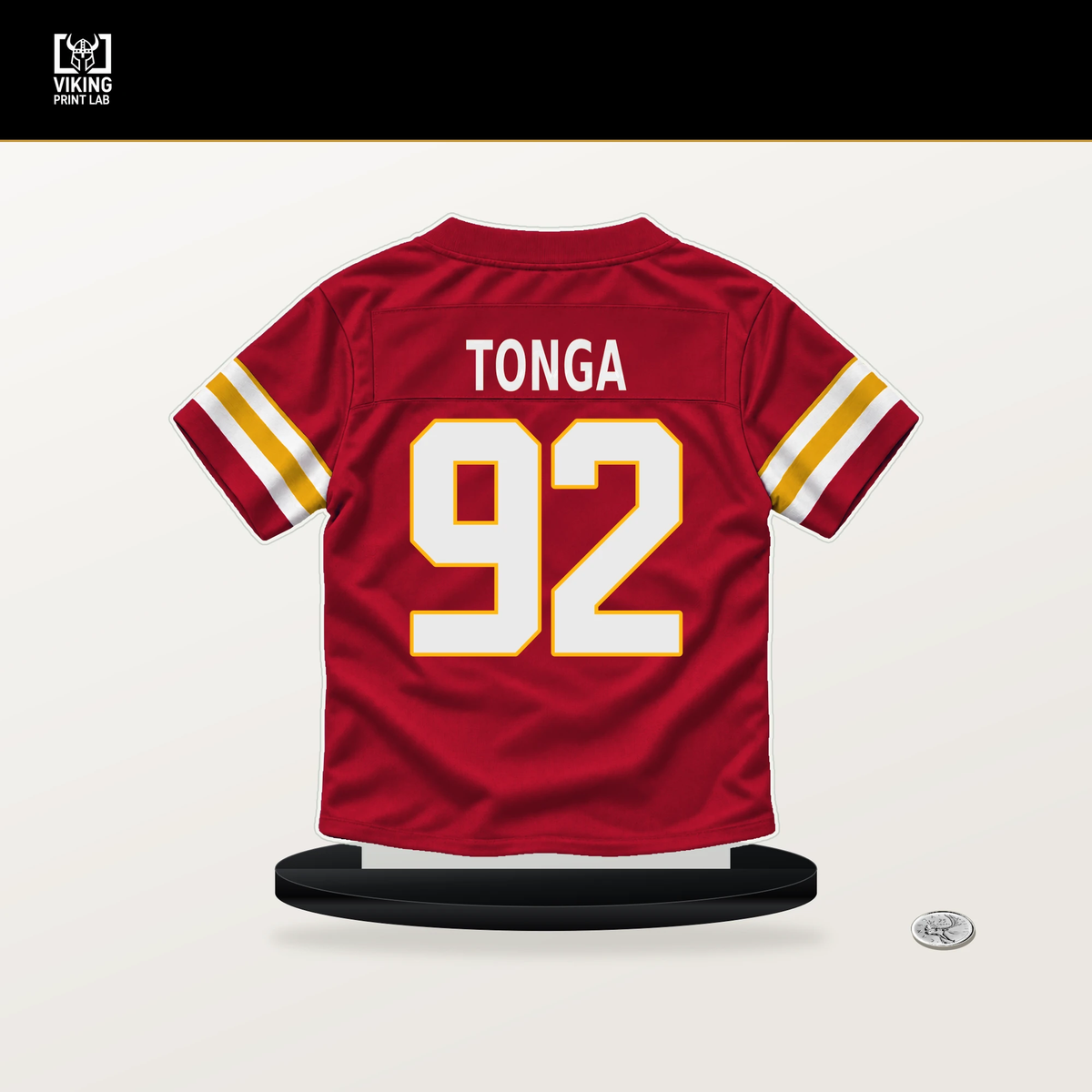 Khyiris Tonga number 92 Kansas City Chiefs jersey stand with included black base.