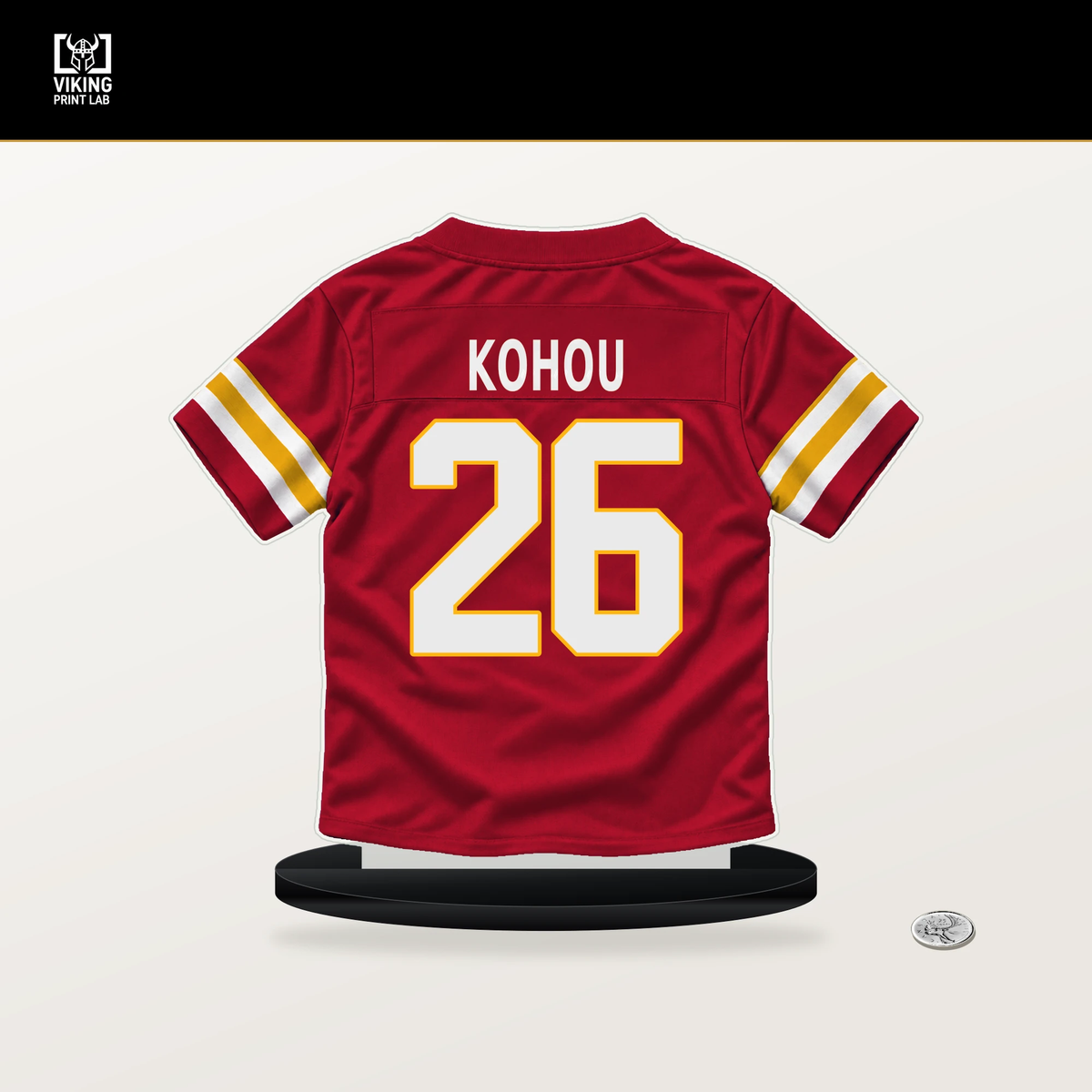 Kader Kohou number 26 Kansas City Chiefs jersey stand with included black base.