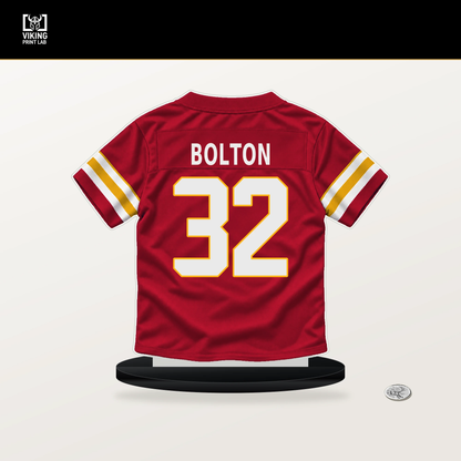 Nick Bolton number 32 Kansas City Chiefs jersey stand with included black base.