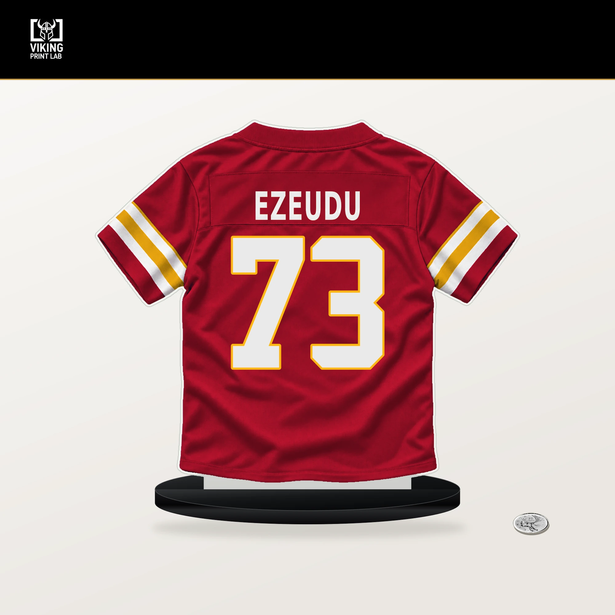 Joshua Ezeudu number 73 Kansas City Chiefs jersey stand with included black base.