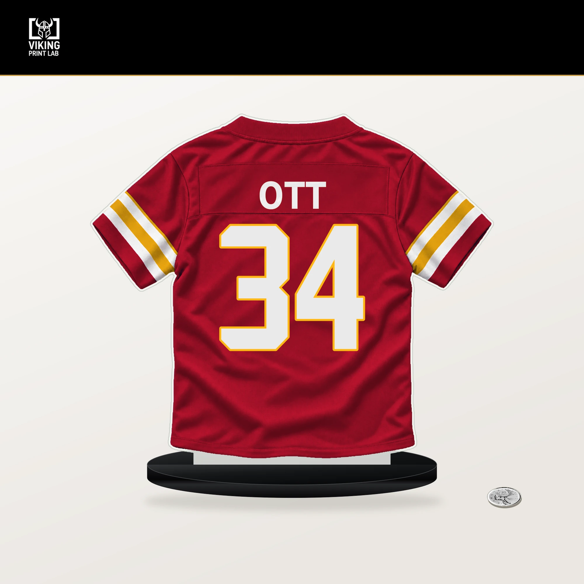 Jaydn Ott number 34 Kansas City Chiefs jersey stand with included black base.