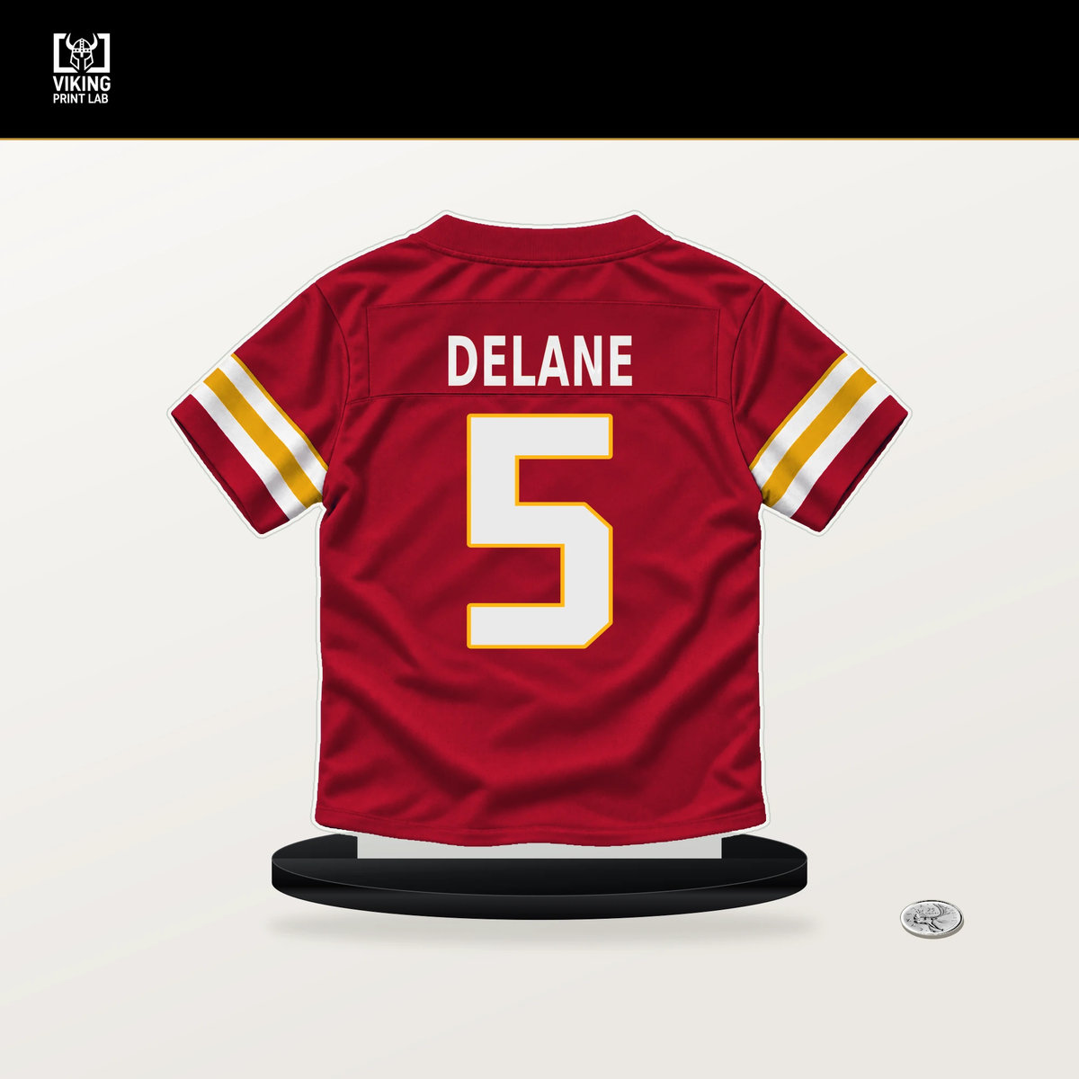 Mansoor Delane number 5 Kansas City Chiefs jersey stand with included black base.