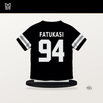 Folorunso Fatukasi number 94 Las Vegas Raiders jersey stand with included black base.