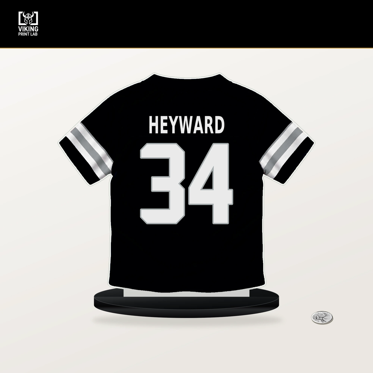 Connor Heyward number 34 Las Vegas Raiders jersey stand with included black base.